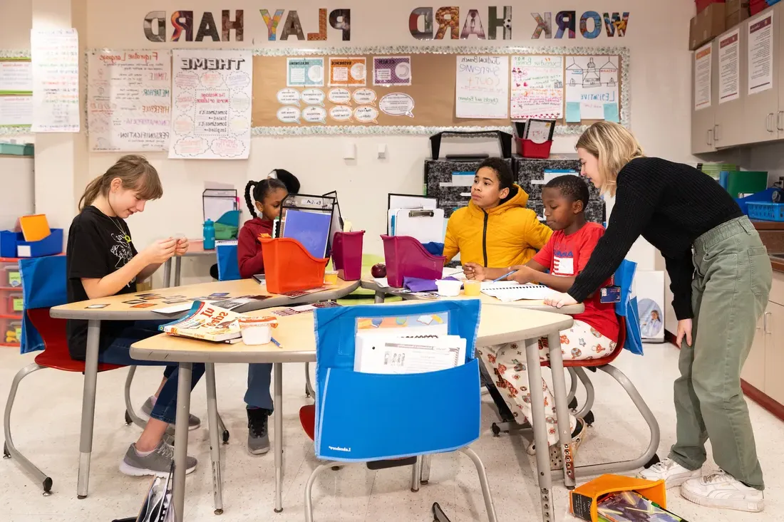 Student working with a local elementary school class.